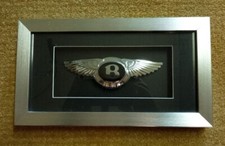 Vintage Chrome Bentley Car Badge In A Silver Box Frame And Mounted. For Display.