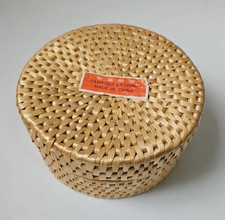 small lidded round wicker/rattan storage box