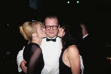 Drew Carey receives kisses