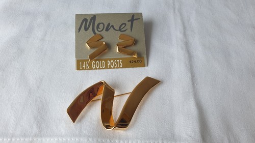 Gold tone earrings and - tone,