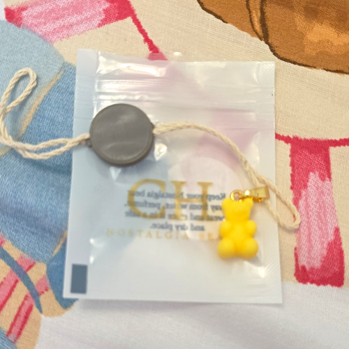 Yellow gummy bear - gummy,