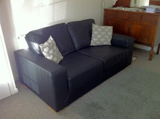 Nabru black leatherette self-assembly sofa - includes parts to make a 3 seater