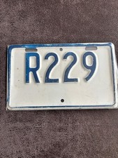 Vintage License Plate R229 Blue on White Embossed Metal Tag Collectible Decor