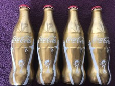 Set of 4 Bottles Coca Cola