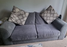 Grey Two 3 seater sofas, in good condition. Have the fire labels on it. 