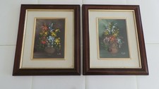 PAIR OF SIGNED FRAMED FLORAL