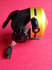 A GOOD USED VINTAGE ABU ABU-MATIC 110 CLOSED FACE BAITCASTING REEL