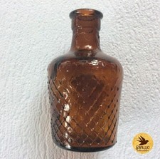 Antique amber glass poison