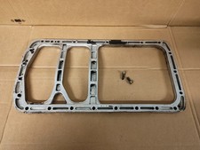 OIL SUMP SPACER & FIXINGS