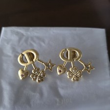Dior Antique Gold lucky charm