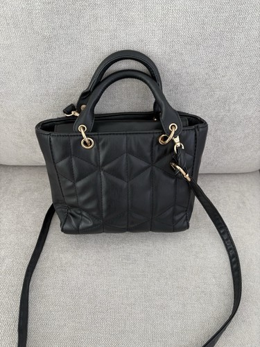 Black gold handbag - &, /