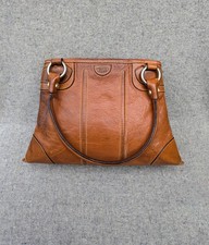 Well used Bric's tan genuine