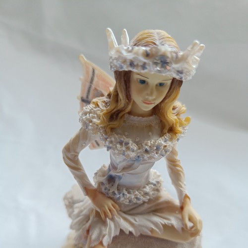 The snowflake faerie figurine - snowflake,