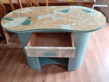 Music themed kidney shaped desk with drawer, finished in light green