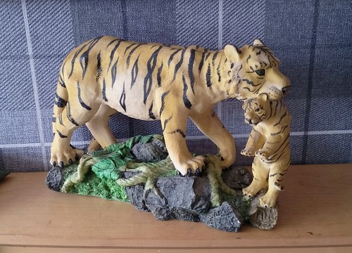 Large tiger carrying - tiger,