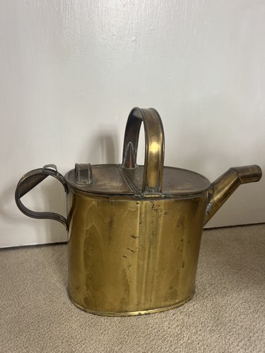 Antique brass metal watering