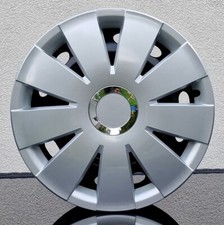 15 inch wheel trims to fit  Nissan ( set of 4) + emblems 