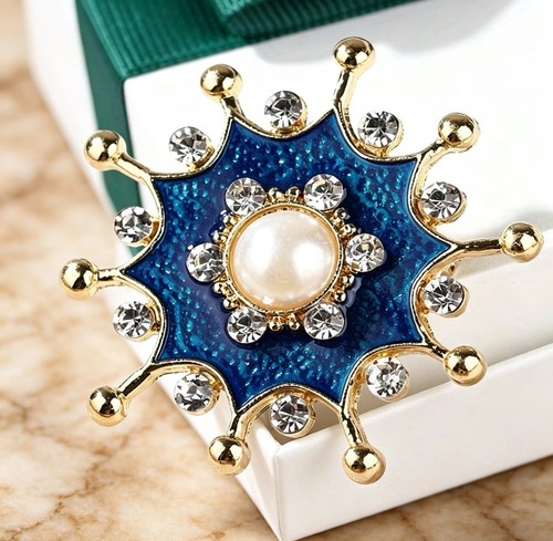 Blue crown brooch