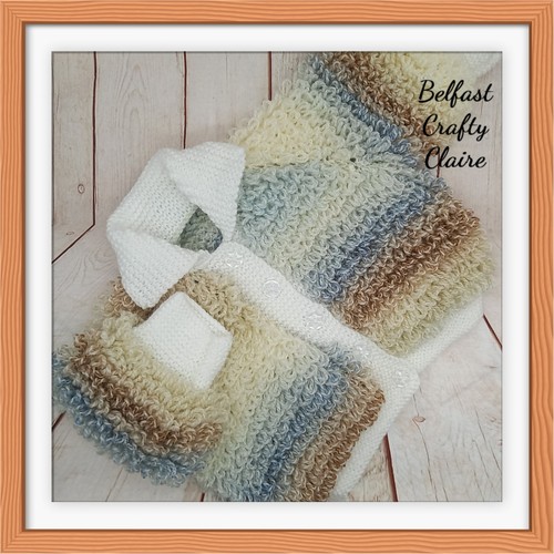 Hand knitted baby loopy - hand,