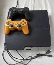 Slim Sony PlayStation 3 with 2 Remotes (1 Rare Gold Controller) & Games