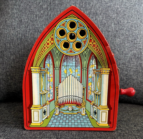 Vintage tin litho musical toy
