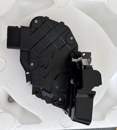 Front right door lock actuator - front,