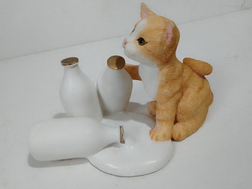 Leonardo ginger cat with milk - leonardo,,