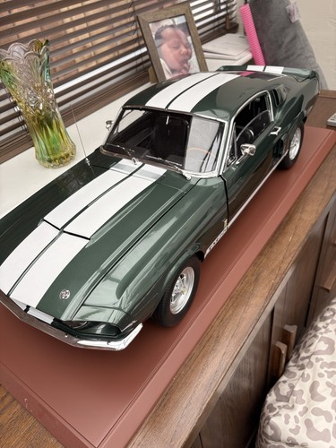 Green white shelby car - green,