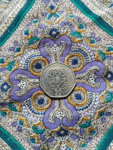 2010 50p coin - celebrating, 100