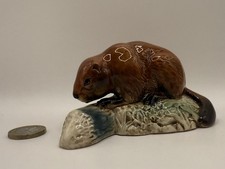 Beswick beaver log facing - beaver,