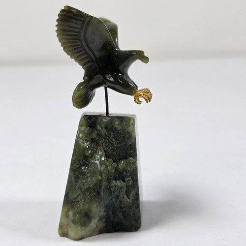 Carved green jade eagle figure - green,