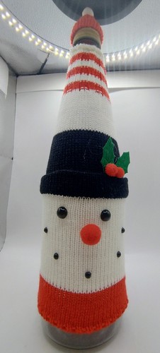 Snowman and hat knitted - and,