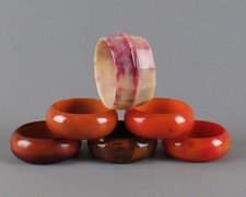 Group 6 Vintage Bakelite / Plastic Napkin Rings Amber, Brown / Green, etc