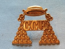 The Oratory School ( Reading ) Officer Training Corp cap badge.