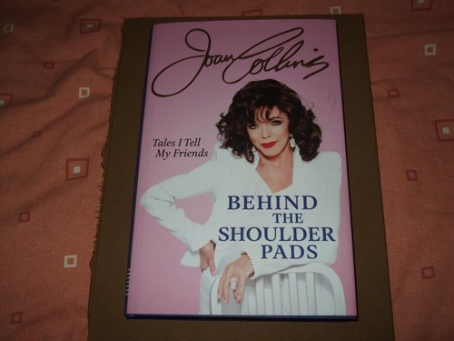 Signed joan collins behind - signed.,