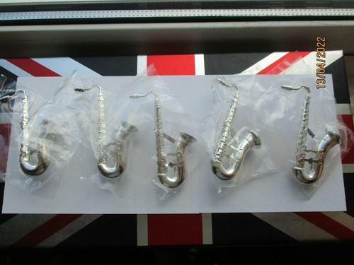 Large silver saxophones - large, jazz