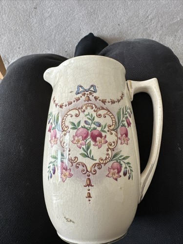 Very old water jug - jug,