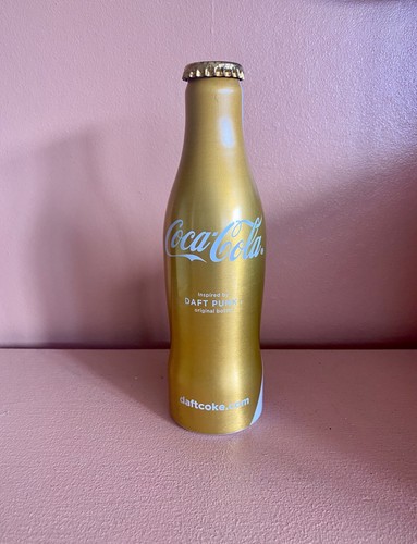 New unopened gold coca cola - new,