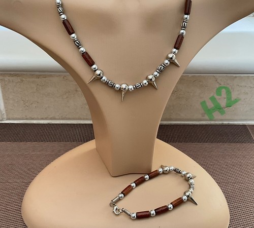Crafted silver tone spike