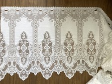 FABRIC REMNANT. 100%  white Polyester lace panel fabric.Length:446cm Width:78cm