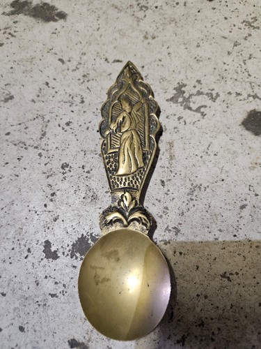 Decorative brass spoon