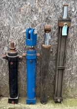 Four Large Hydraulic Rams, Two