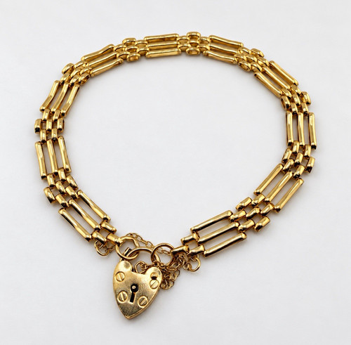 9ct yellow gold three - 9ct,