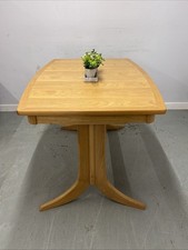 Nathan Shades Boat Shaped Extending Dining Table – Oak Finish