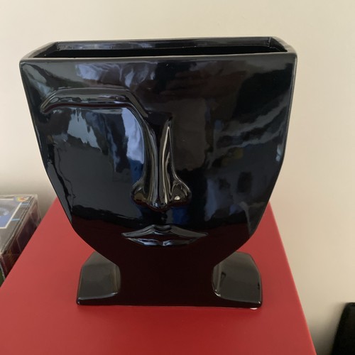 Black face eyebrow vase - face,
