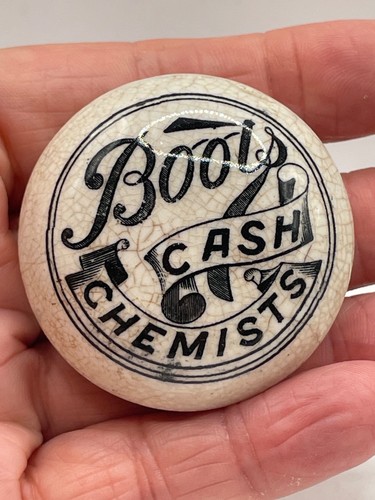 Antique porcelain bottle top