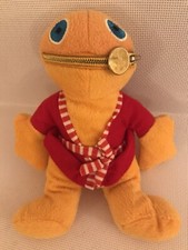 Rainbow Zippy Wearing A Red
