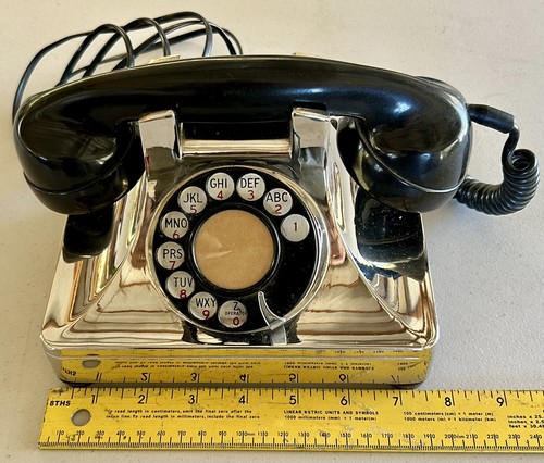 Antique rotary desk telephone