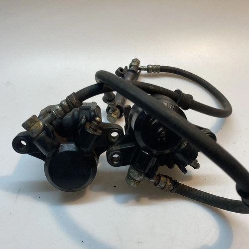 Front brake caliper - front,