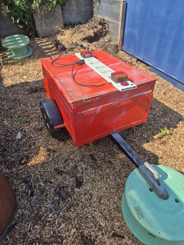 Small trailer with hinged - trailer, lid